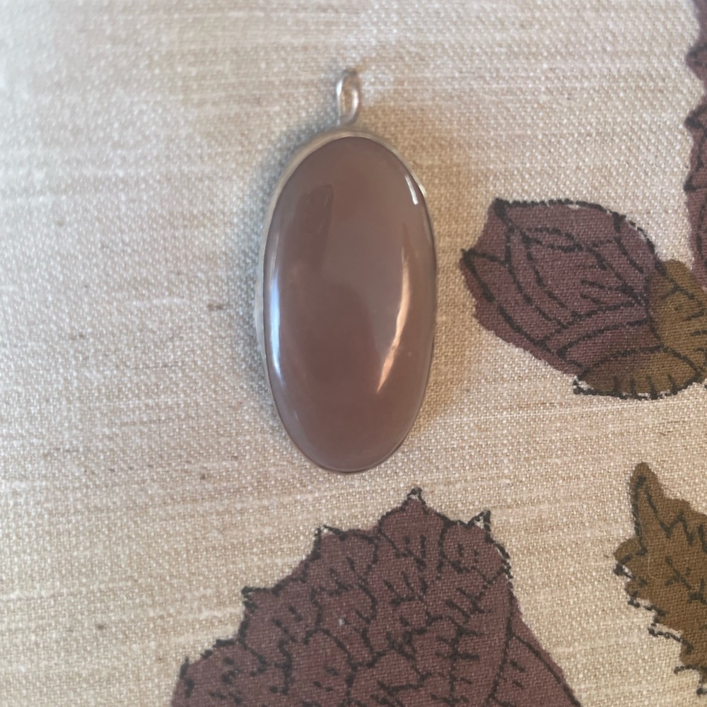 Artisan Peach moonstone pendant with brass and sterling silver